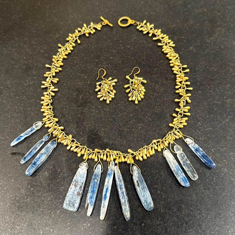 Blue Stones/Crystals on gold beaded necklace with matching earrings